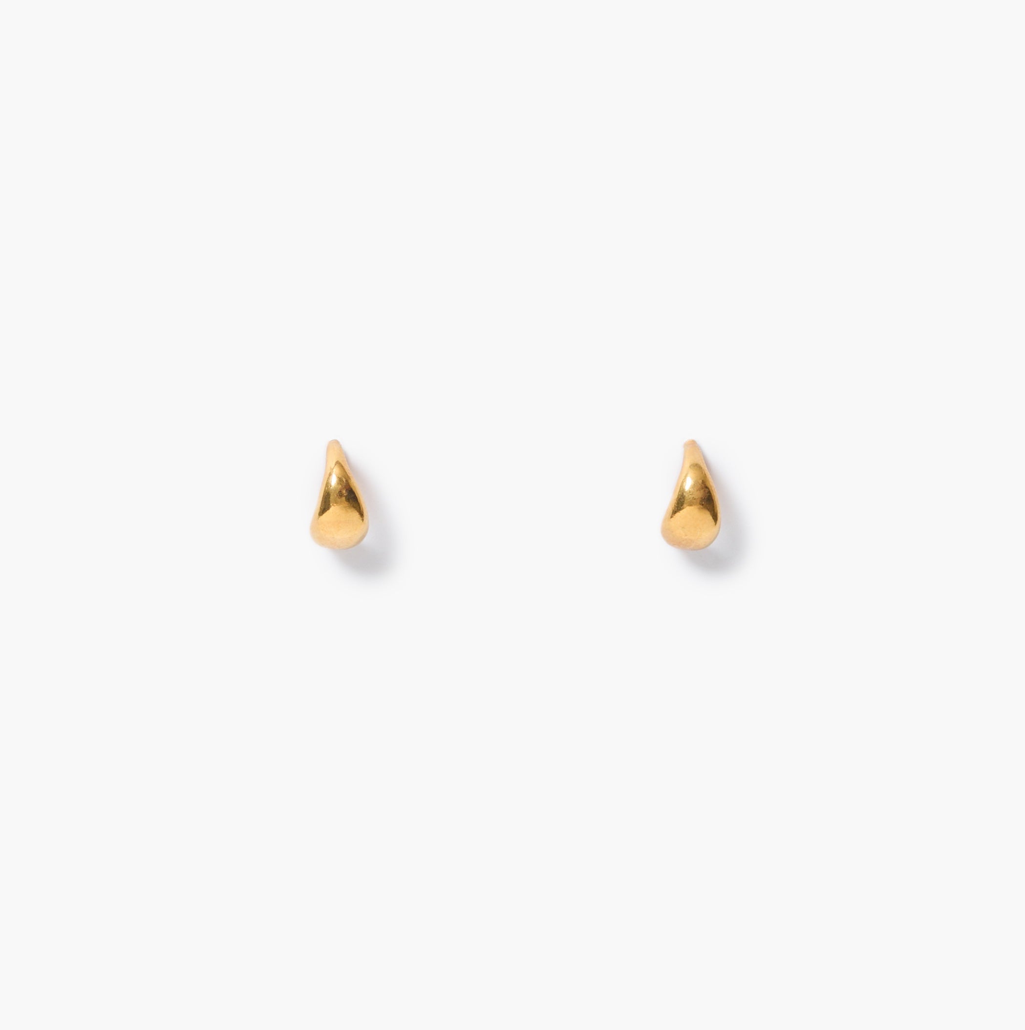 Pair of smooth tiny teardrop hoops on a white background