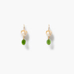 A pair of gold-tone dangle earrings featuring a white pearl and a peridot charm, displayed on a clean white background.