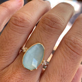 Pastel Aquamarine Ring with Diamond Clusters