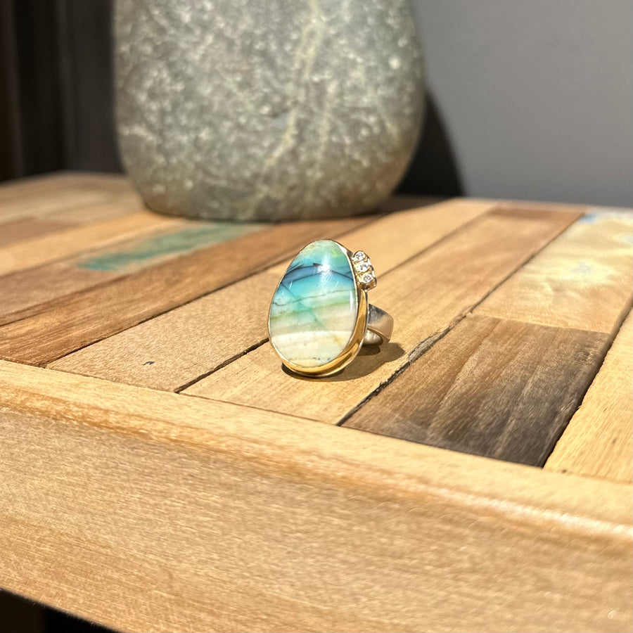 Indonesian Blue Opal With Triple Satellite Diamonds