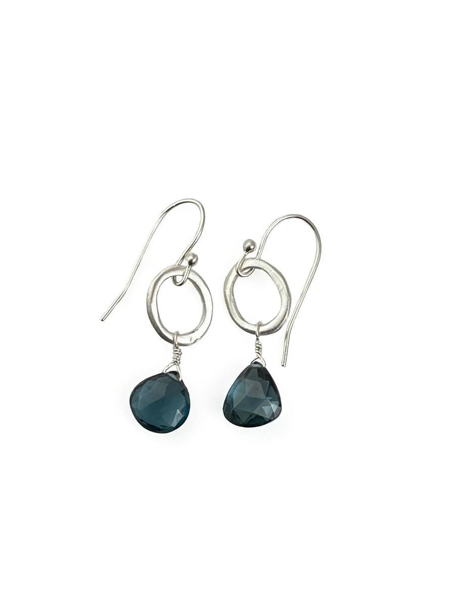 Small circles with blue topaz