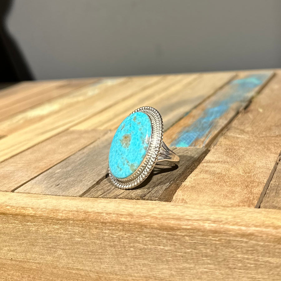Oval Turquoise with Decorative Silver Edge